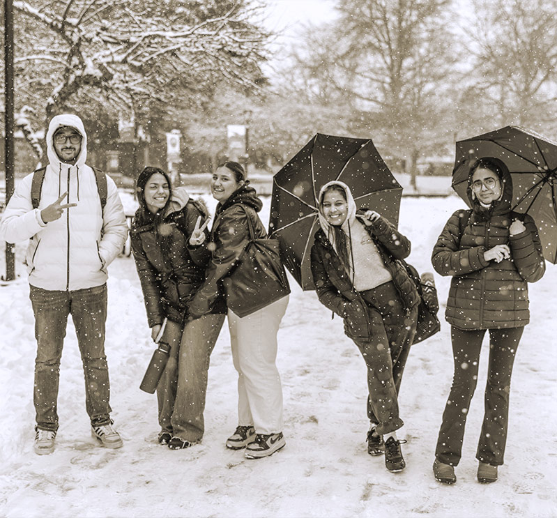College students out in the snow