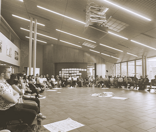 A large group of CICan staff members sitting in auditorium