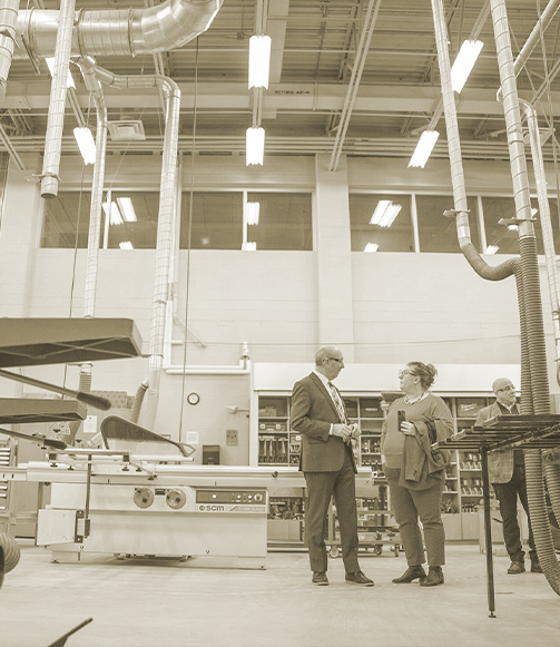 Two staff members having a discussion